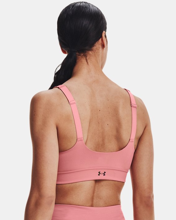 Women's UA RUSH™ Mid Sports Bra in Pink image number 1